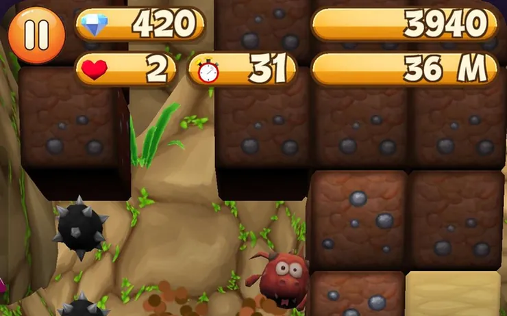 Digging Deep gameplay: the digger among dirt blocks and spiked mines